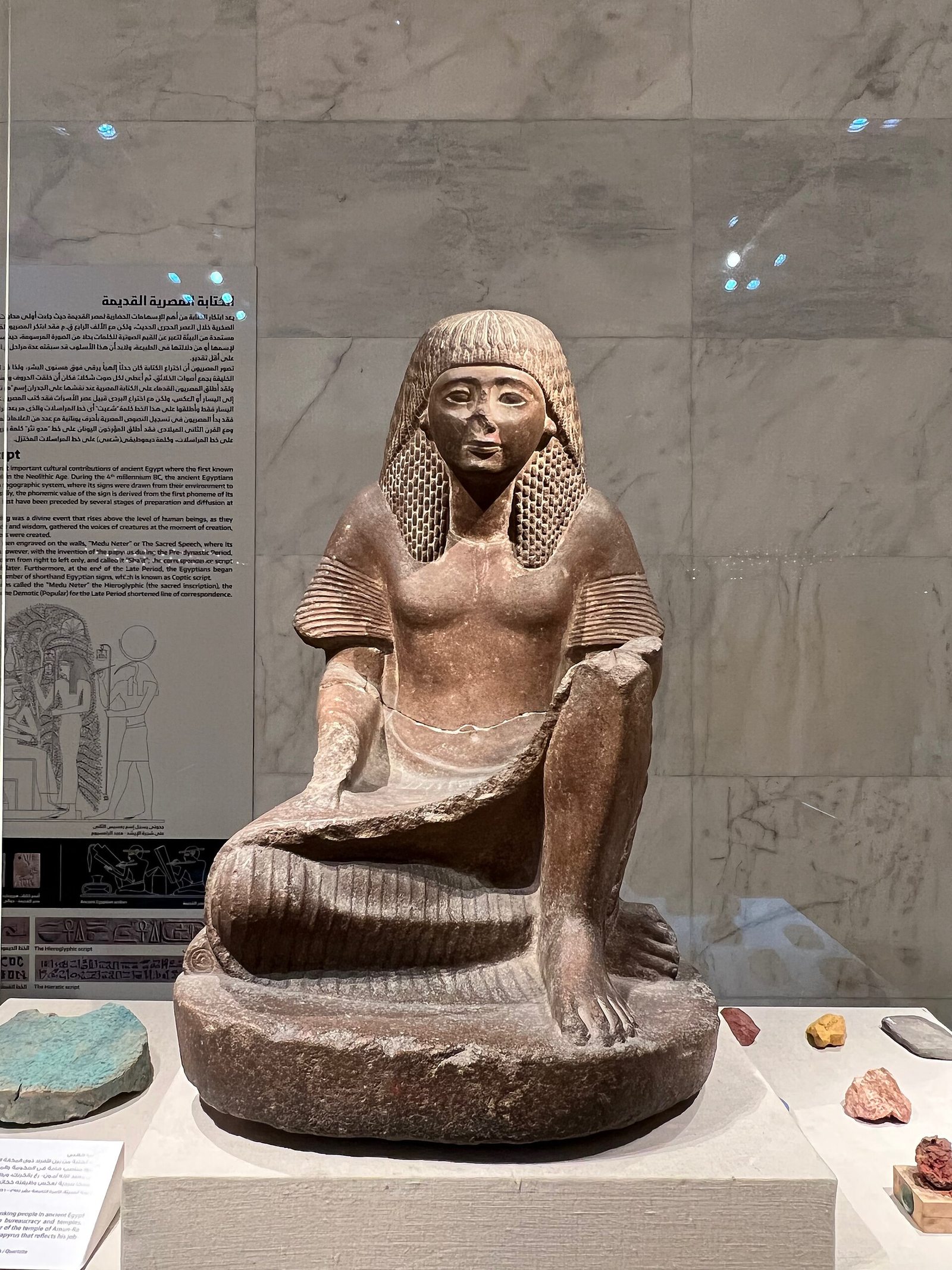 Seated statue displayed at the National Museum of Egyptian Civilization